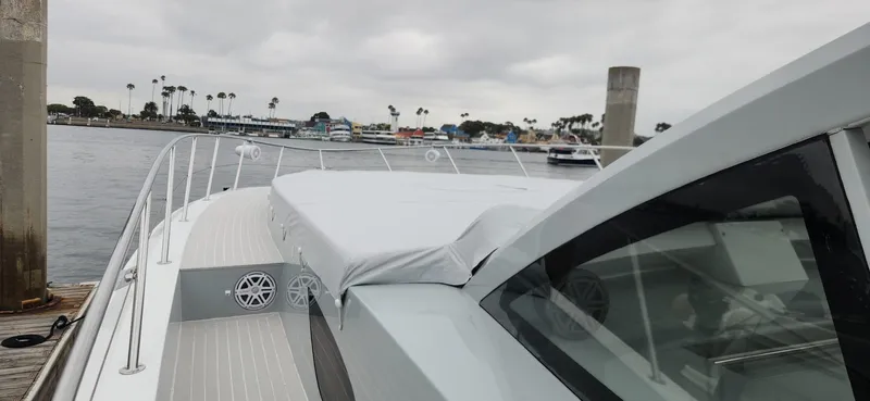 Catch And Release Yacht Photos Pics Luxurious 2017 Trident Custom yacht docked by the waterfront on a cloudy day.