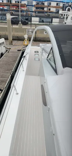 Catch And Release Yacht Photos Pics 2017 Trident Custom boat docked at marina, featuring sleek white deck design.