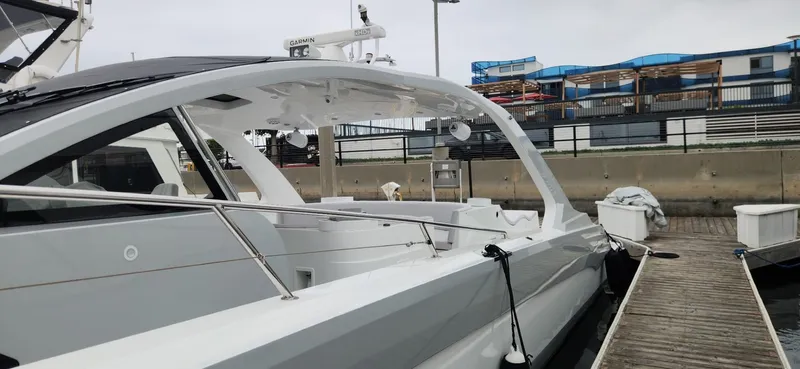 Catch And Release Yacht Photos Pics Luxury 2017 Trident Custom yacht docked at marina, showcasing sleek design and modern features.