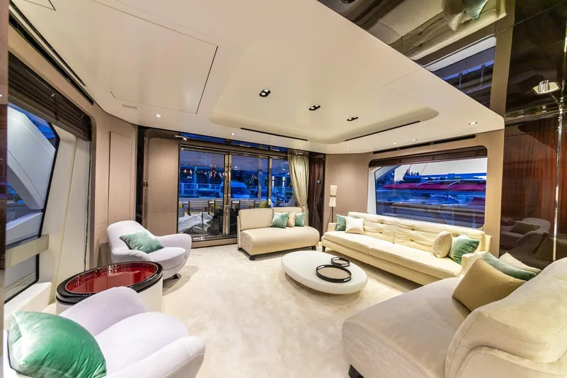 Nirvana By The Sea Yacht Photos Pics Luxurious interior of 2019 Azimut Grande 27 METRI yacht with elegant seating and modern decor.