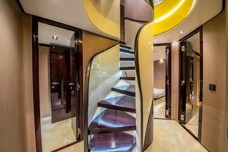 Nirvana By The Sea Yacht Photos Pics Luxurious interior of 2019 Azimut Grande 27 METRI yacht with elegant spiral staircase.