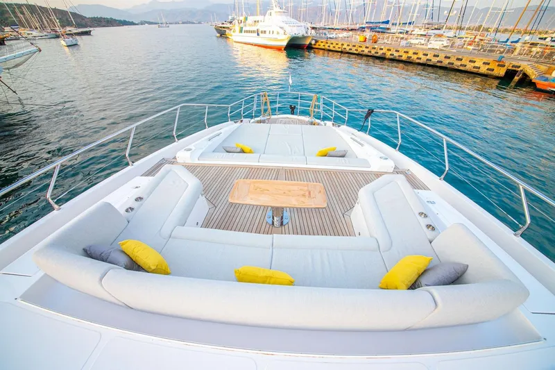 Nirvana By The Sea Yacht Photos Pics Luxurious 2019 Azimut Grande 27 METRI yacht deck with elegant seating and scenic marina view.