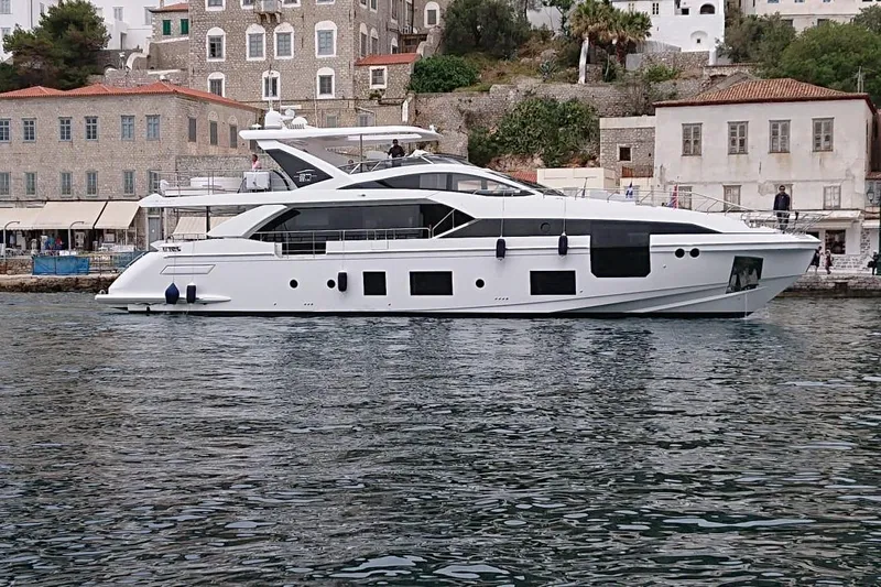 Nirvana By The Sea Yacht Photos Pics Luxury 2019 Azimut Grande 27 METRI yacht docked near historic buildings.