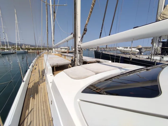  Yacht Photos Pics Sailing yacht CMN 139, 1994 model, docked at marina with clear blue sky.