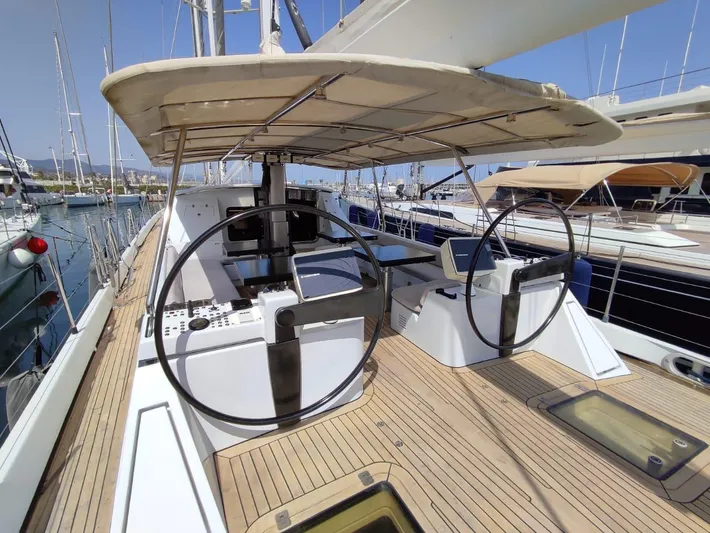  Yacht Photos Pics Sailing yacht deck with dual steering wheels, CMN 139 model, 1994, docked at marina.