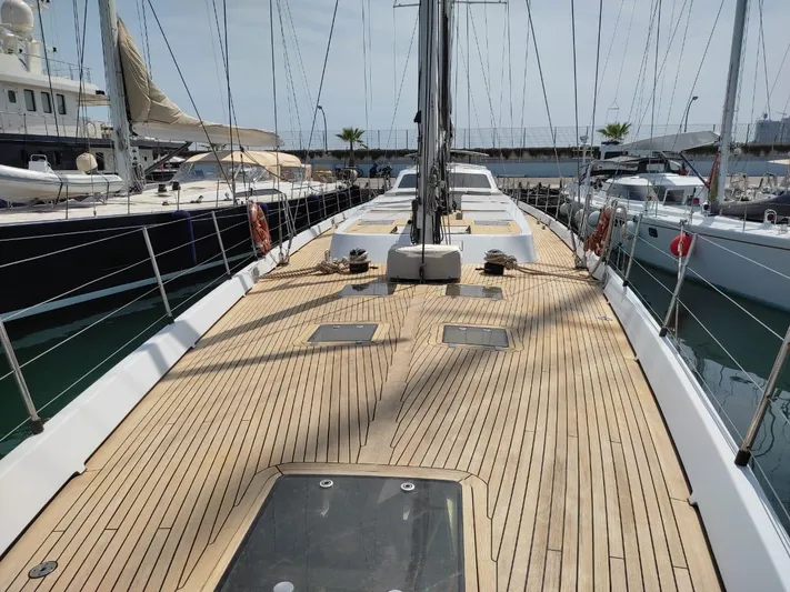  Yacht Photos Pics Sailing yacht deck with wooden finish, CMN 139 model, 1994, docked in marina.