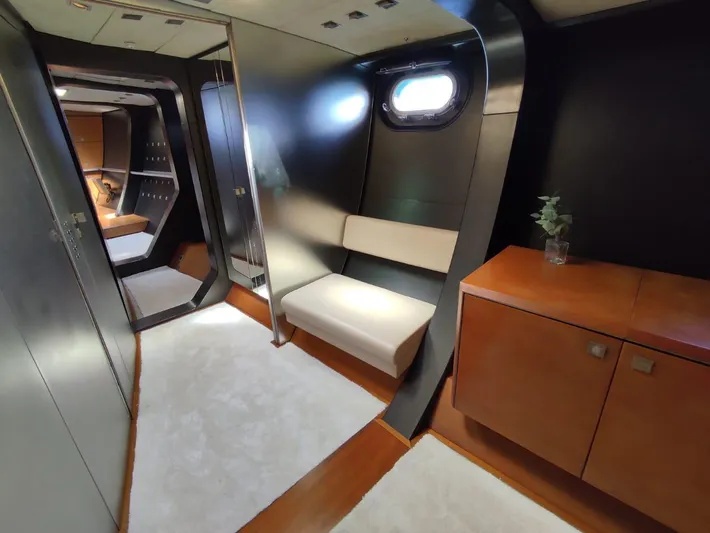  Yacht Photos Pics Luxurious yacht interior with modern seating, wooden cabinetry, and sleek design, CMN 139, 1994 model.