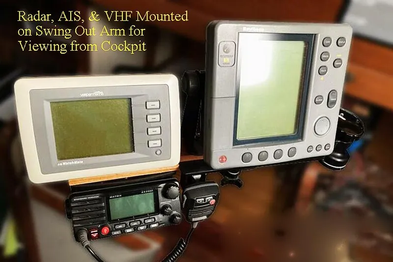 Jolie Brise Yacht Photos Pics Radar, AIS, and VHF mounted on swing-out arm for cockpit viewing on 1985 Bristol Chanel Cutter.