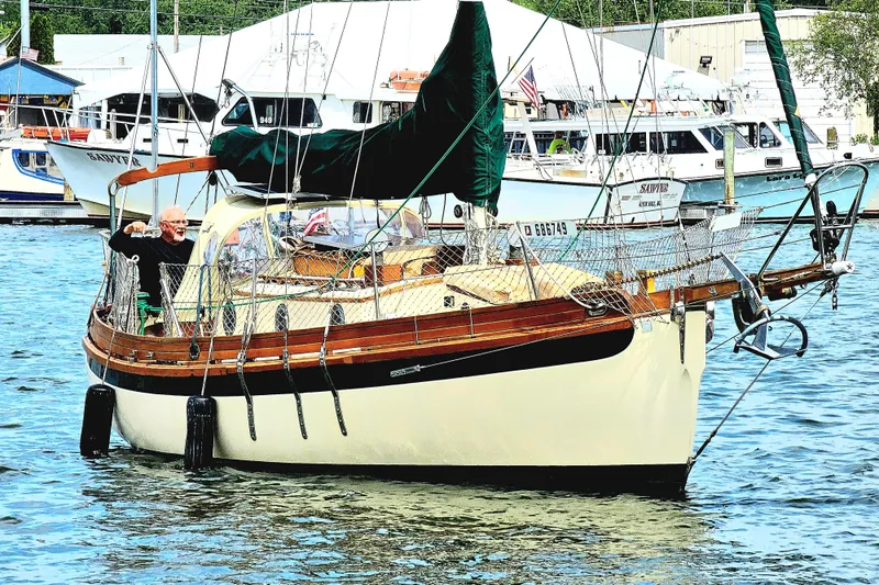 Jolie Brise Yacht Photos Pics 1985 Sam L. Morse Bristol Channel Cutter 28 sailboat docked in marina.