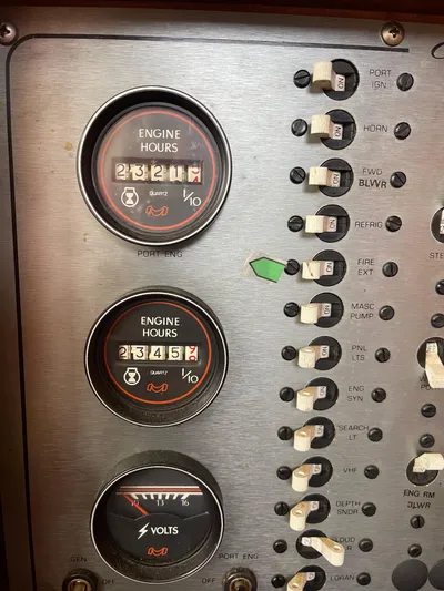 Kylieb Yacht Photos Pics Control panel of 1986 Chris-Craft 422 Commander with engine hours and voltage gauges.