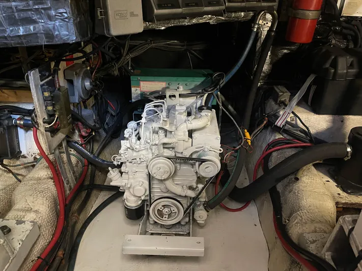 Kylieb Yacht Photos Pics Engine room of 1986 Chris-Craft 422 Commander with visible wiring and components.