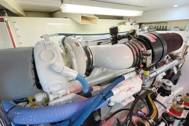 "mi Alma" Yacht Photos Pics Engine room of a 2004 West Bay Sonship yacht, showcasing detailed mechanical components.