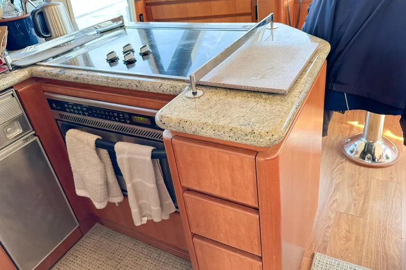 "mi Alma" Yacht Photos Pics 2004 West Bay Sonship yacht kitchen with granite countertops and modern appliances.