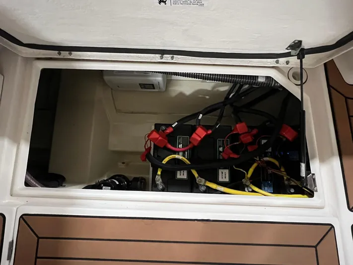 Regulus Yacht Photos Pics 2023 Ranger Tugs R-25 battery compartment with wiring and connections.