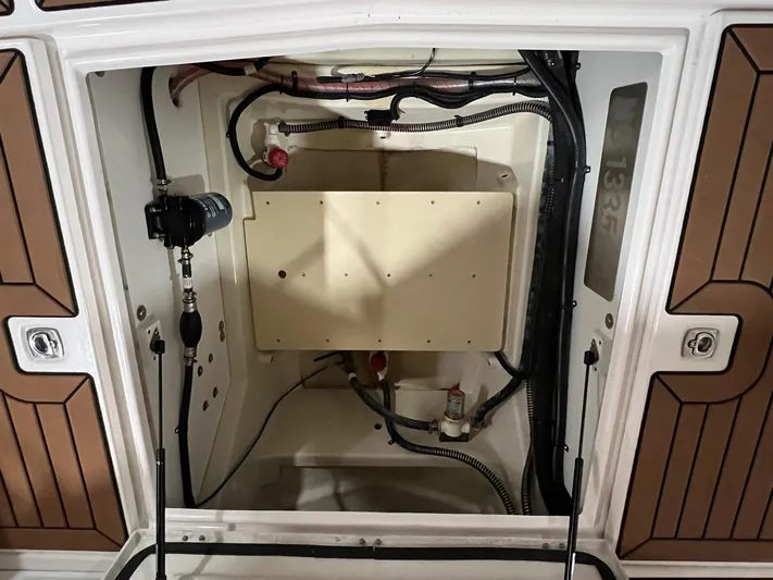 Regulus Yacht Photos Pics 2023 Ranger Tugs R-25 engine compartment with wiring and components.