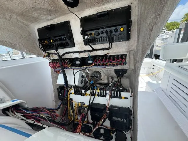 Sea Stress Yacht Photos Pics Electrical system of a 2008 Pro-Line 32 Express boat, showcasing wiring and control panels.