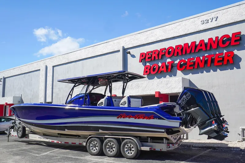  Yacht Photos Pics 2020 Nor-Tech 390 Center Console boat at Performance Boat Center, featuring triple engines.