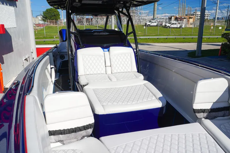  Yacht Photos Pics 2020 Nor-Tech 390 Center Console boat with luxurious white seating and sleek design.