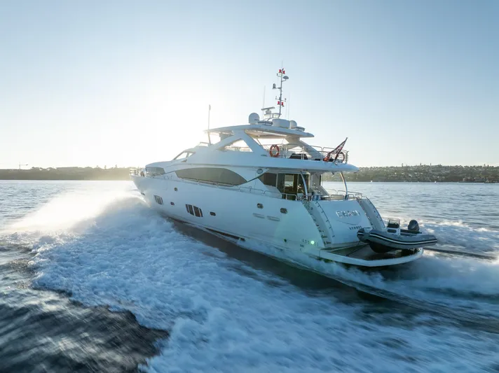 2010 Sunseeker Super Yacht Yacht Photos Pics Luxurious 2010 Sunseeker 30m yacht cruising on open water at sunset.