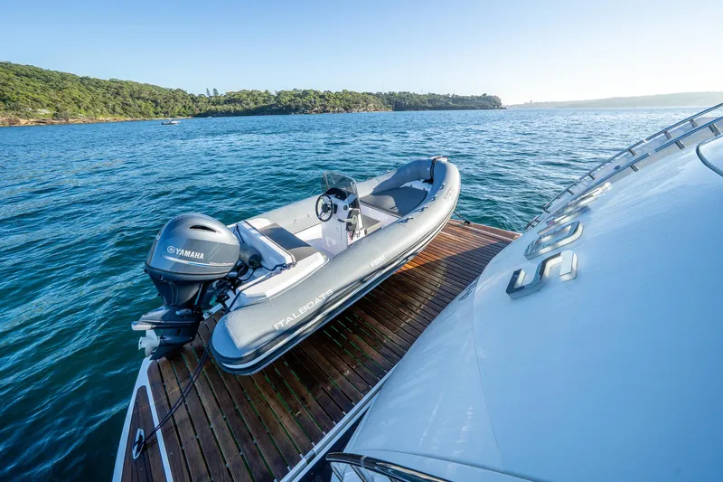 2010 Sunseeker Super Yacht Yacht Photos Pics Sunseeker 30m yacht with tender boat on deck, 2010 model, scenic ocean view.