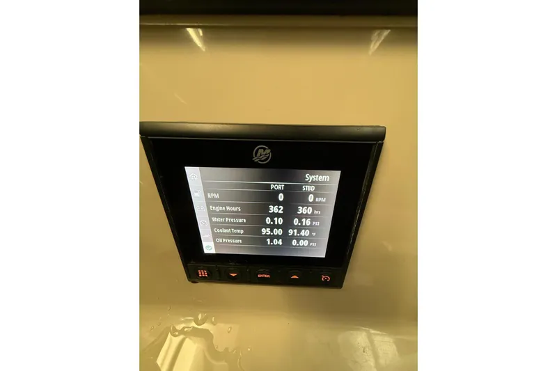  Yacht Photos Pics Display screen on 2022 Boston Whaler 330 Outrage showing engine metrics.