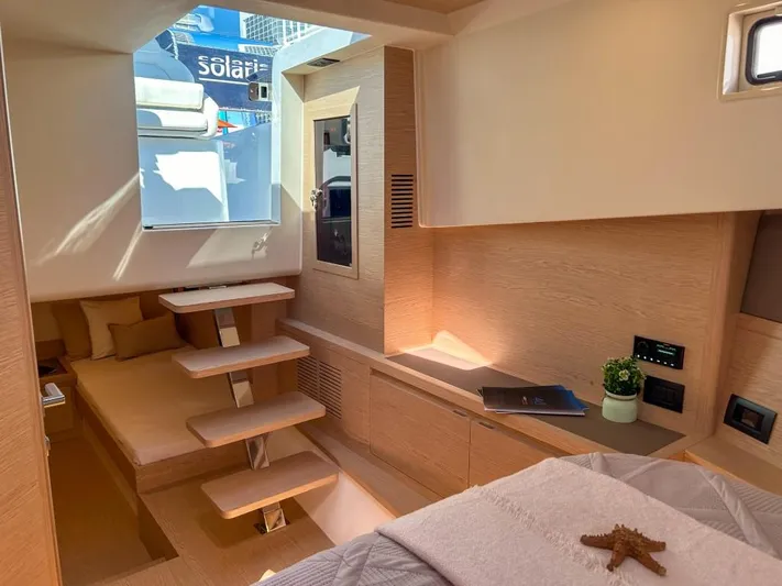  Yacht Photos Pics Interior of 2024 Solaris Power 40 Open yacht with modern wooden design.