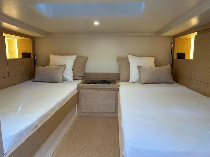  Yacht Photos Pics Interior cabin of 2024 Solaris Power 40 Open with twin beds and modern design.