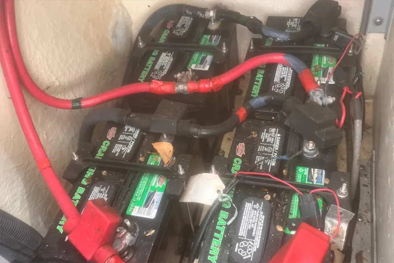 No Woke Zone Yacht Photos Pics Battery compartment of a 2008 Sea Ray 310 Sundancer with multiple connected batteries.