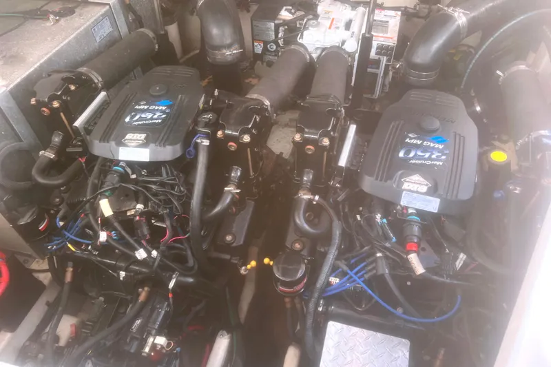 No Woke Zone Yacht Photos Pics Engine compartment of a 2008 Sea Ray 310 Sundancer with twin MerCruiser 350 MAG MPI engines.