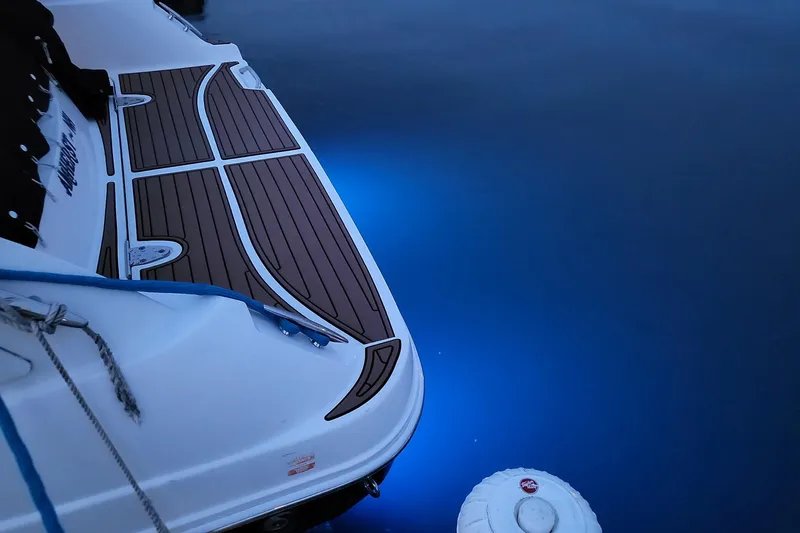 No Woke Zone Yacht Photos Pics 2008 Sea Ray 310 Sundancer with blue underwater lights and wooden deck.