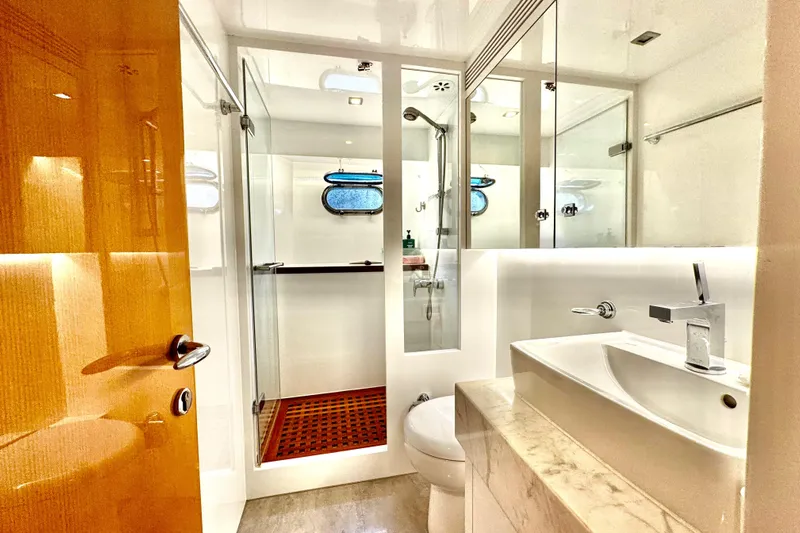 Tortuga Yacht Photos Pics Luxurious bathroom on 2011 Horizon E88 yacht with modern fixtures and elegant design.
