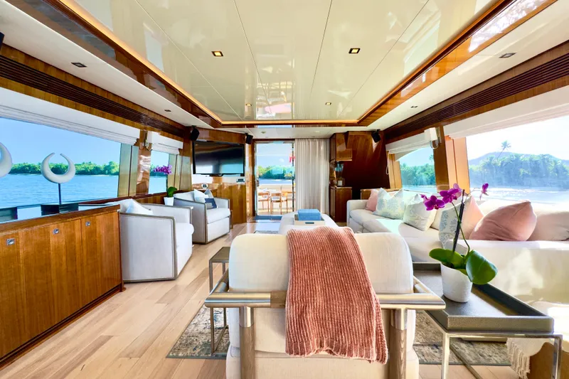 Tortuga Yacht Photos Pics Luxurious interior of 2011 Horizon E88 yacht with elegant furnishings and scenic ocean views.