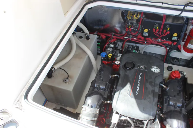  Yacht Photos Pics 2014 Regal 32 Express engine compartment with Volvo Penta V8 engine and wiring.