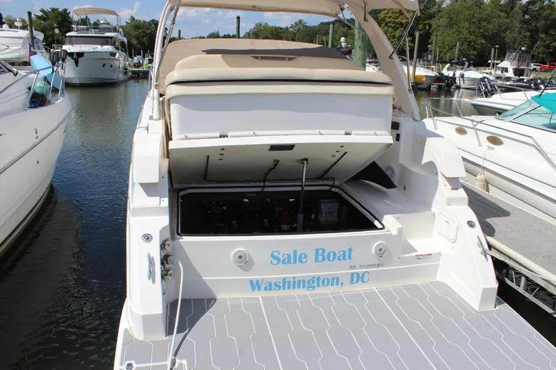  Yacht Photos Pics 2014 Regal 32 Express boat docked, open engine compartment, "Sale Boat" text, Washington, DC.
