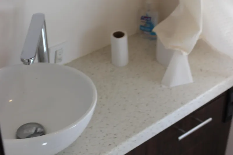  Yacht Photos Pics Modern bathroom sink on Regal 32 Express 2014 boat with countertop essentials.