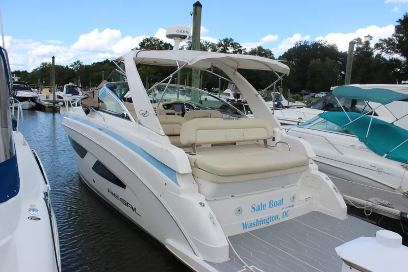  Yacht Photos Pics 2014 Regal 32 Express boat docked in Washington, DC marina.