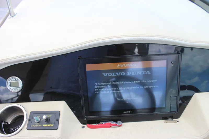  Yacht Photos Pics Control panel of a 2014 Regal 32 Express boat with Volvo Penta display.