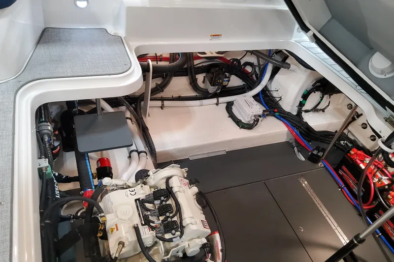  Yacht Photos Pics Engine compartment of 2026 Formula 330 Crossover Bowrider OB, showcasing advanced wiring and components.