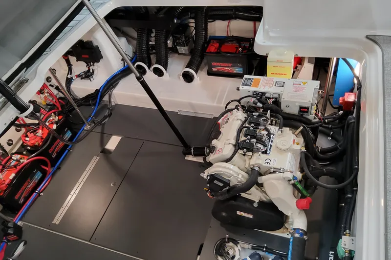  Yacht Photos Pics Engine compartment of 2026 Formula 330 Crossover Bowrider OB with visible wiring and components.