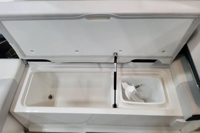  Yacht Photos Pics 2026 Formula 330 Crossover Bowrider OB storage compartment with open lid and hydraulic support.