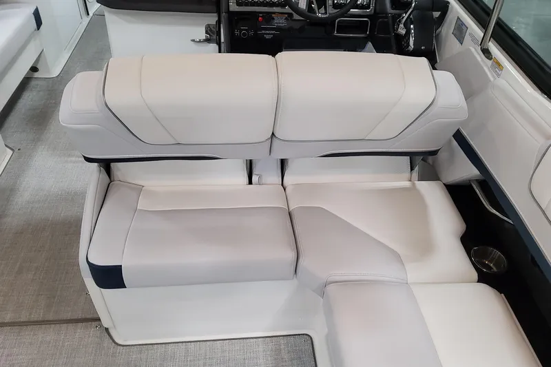  Yacht Photos Pics 2026 Formula 330 Crossover Bowrider OB interior seating, featuring luxurious white upholstery.