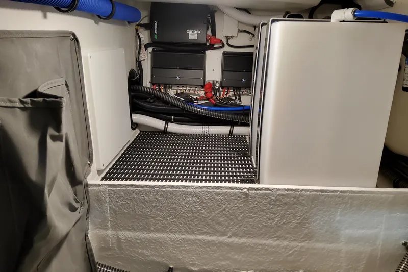 Yacht Photos Pics 2026 Formula 330 Crossover Bowrider OB engine compartment with electrical components and wiring.