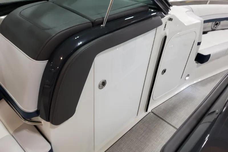  Yacht Photos Pics 2026 Formula 330 Crossover Bowrider OB interior, featuring sleek seating and storage compartments.