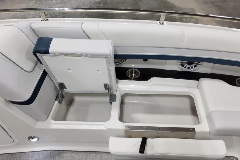  Yacht Photos Pics 2026 Formula 330 Crossover Bowrider OB interior seating with storage compartment open.