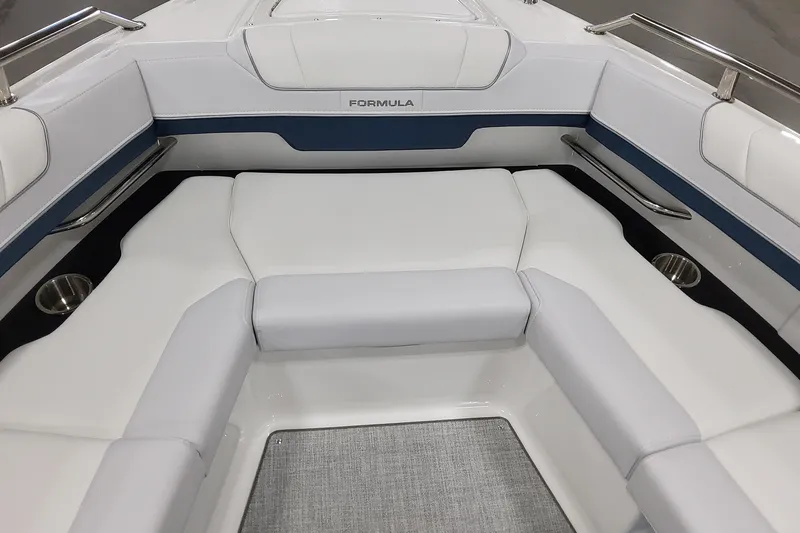  Yacht Photos Pics 2026 Formula 330 Crossover Bowrider OB interior with white seating and stainless steel accents.