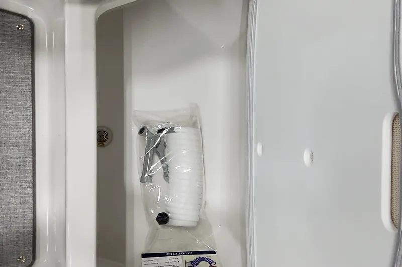  Yacht Photos Pics Storage compartment in 2026 Formula 330 Crossover Bowrider OB with accessories.