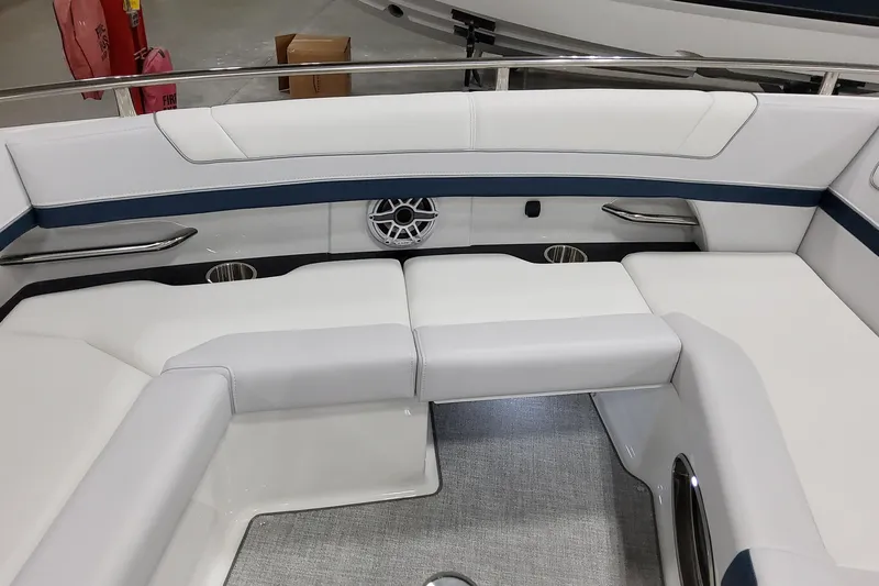  Yacht Photos Pics 2026 Formula 330 Crossover Bowrider OB interior with white seating and speaker detail.