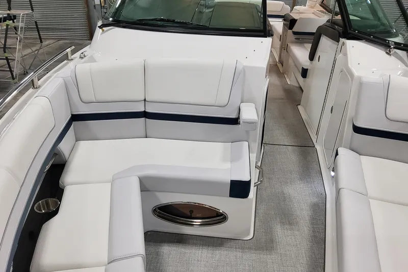  Yacht Photos Pics 2026 Formula 330 Crossover Bowrider OB interior with white seating and modern design.