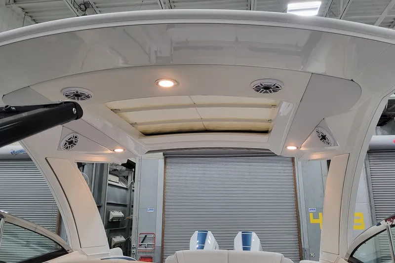  Yacht Photos Pics 2026 Formula 330 Crossover Bowrider OB interior with speakers and lighting.