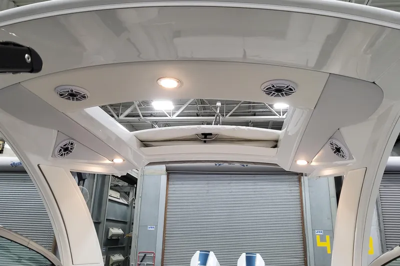  Yacht Photos Pics 2026 Formula 330 Crossover Bowrider OB interior with speakers and lighting.